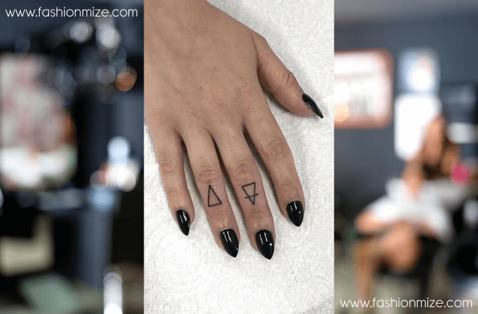 Tiny Triangle Finger Tattoo